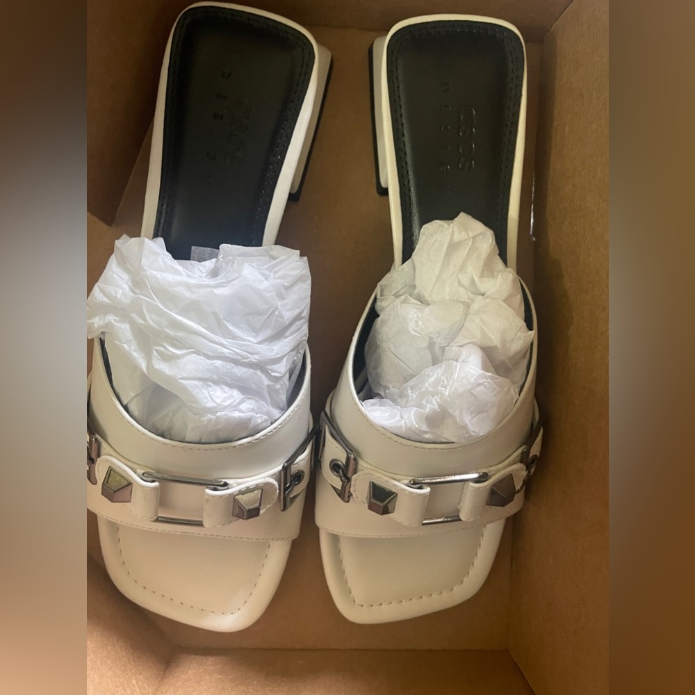 Fortress stud and buckle heeled sandal in off white